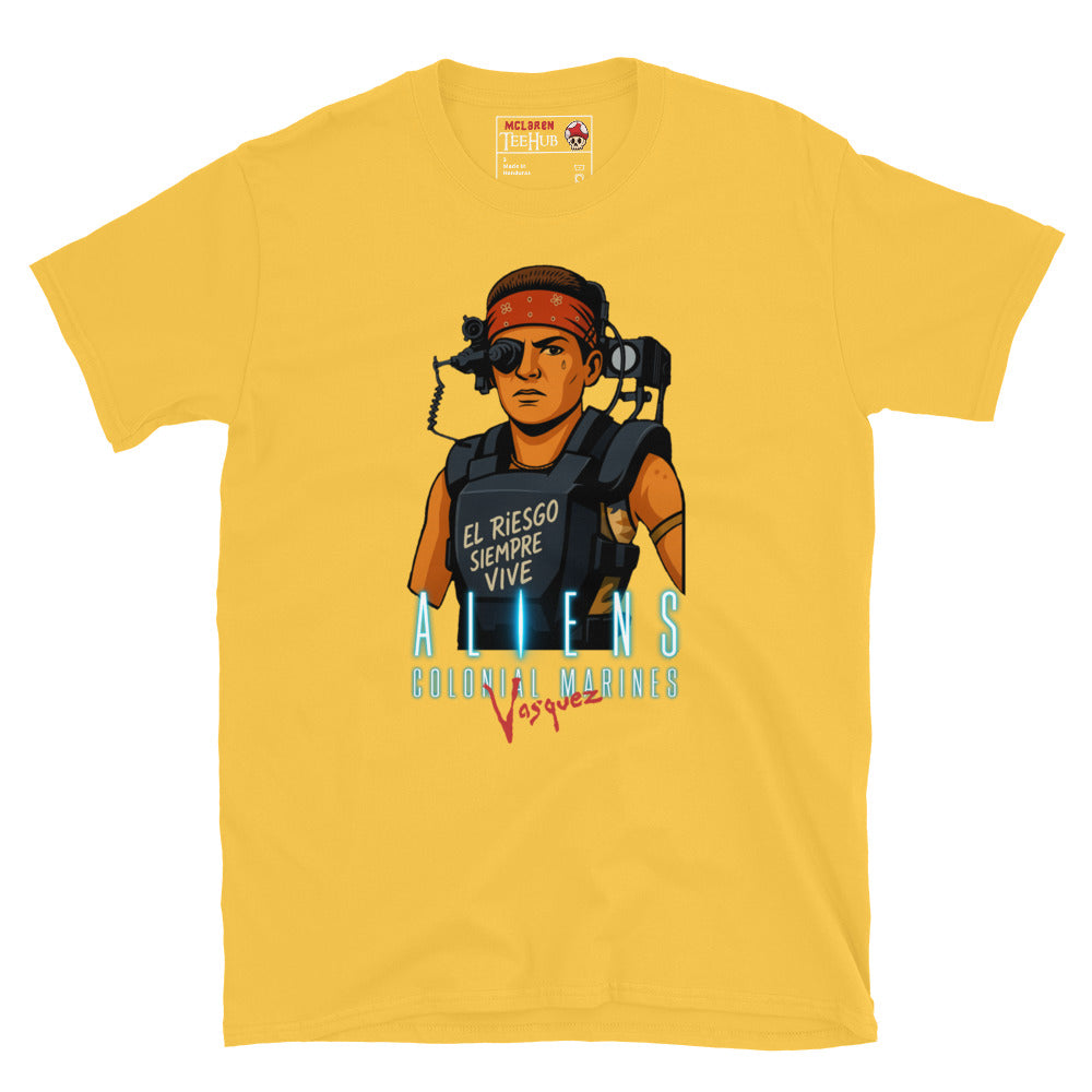 Daisy Yellow Aliens Colonial Marines Vasquez T-shirt featuring cartoon Vasquez in red bandana with “El Riesgo Siempre Vive” text on armor.