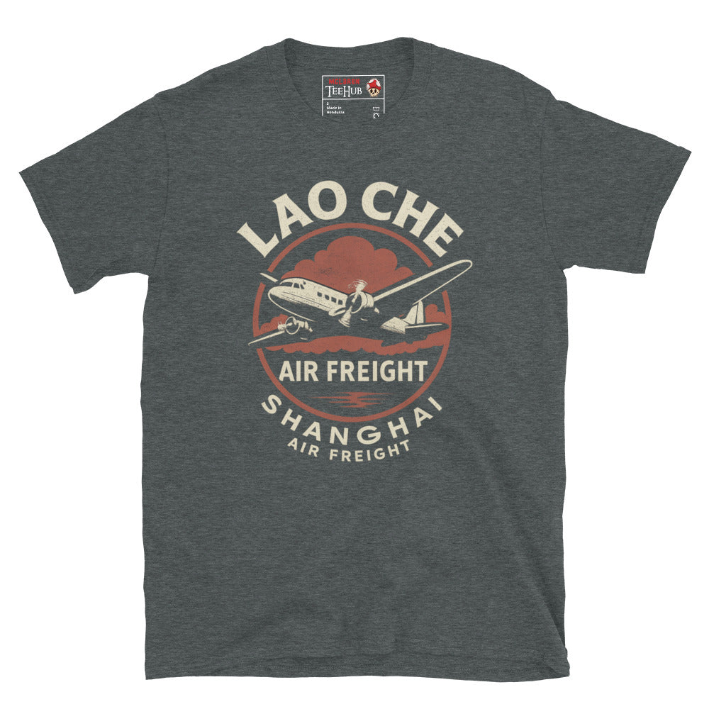 Dark Heather T-shirt featuring a retro prop plane with text “Lao Che Air Freight Shanghai” in a vintage Indiana Jones–style design.