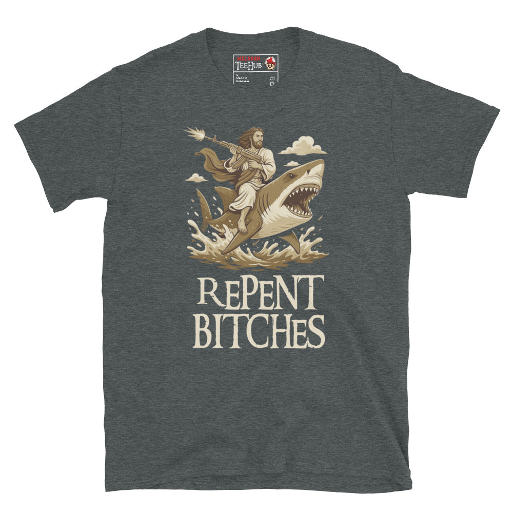 Dark Heather T-shirt featuring an illustration of Jesus riding a shark and holding a machine gun, with the phrase “Repent Bitches” written below.