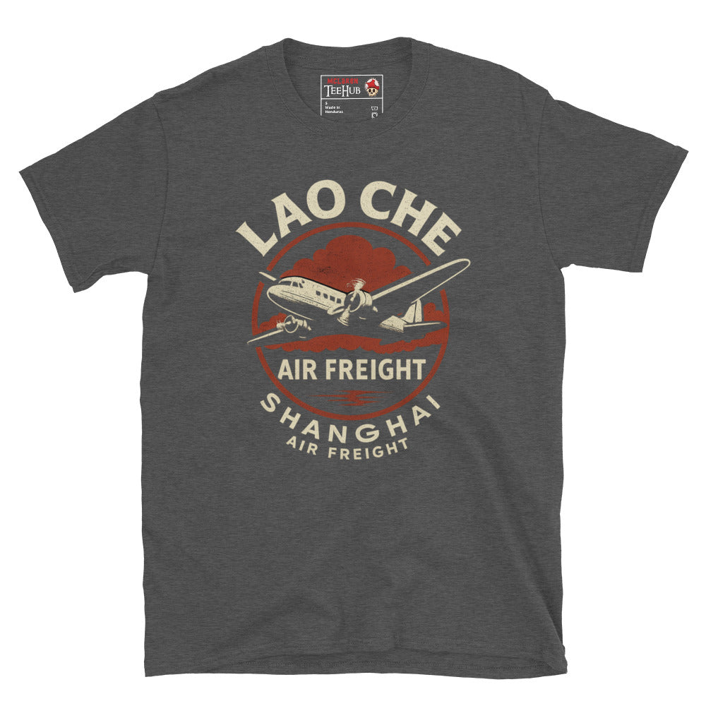Dark Heather Grey T-shirt featuring a retro prop plane with text “Lao Che Air Freight Shanghai” in a vintage Indiana Jones–style design.