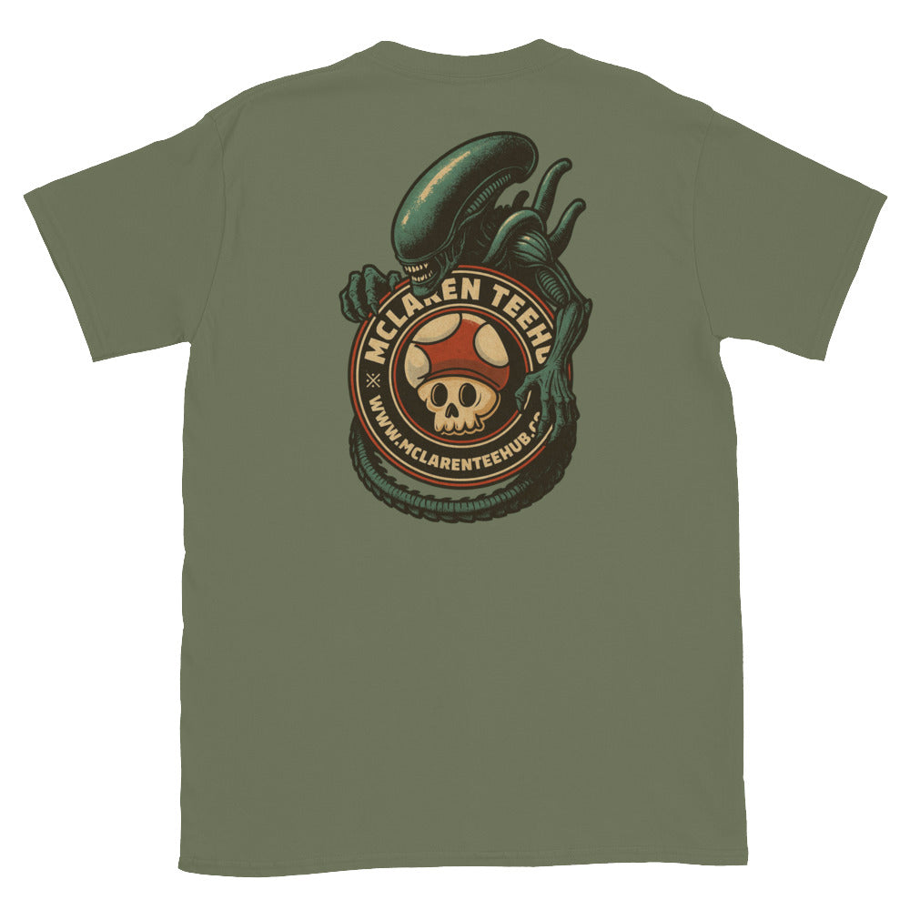 Large graphic on back of military green T-shirt featuring an alien creature wrapped around the McLaren Tee Hub skull mushroom emblem.