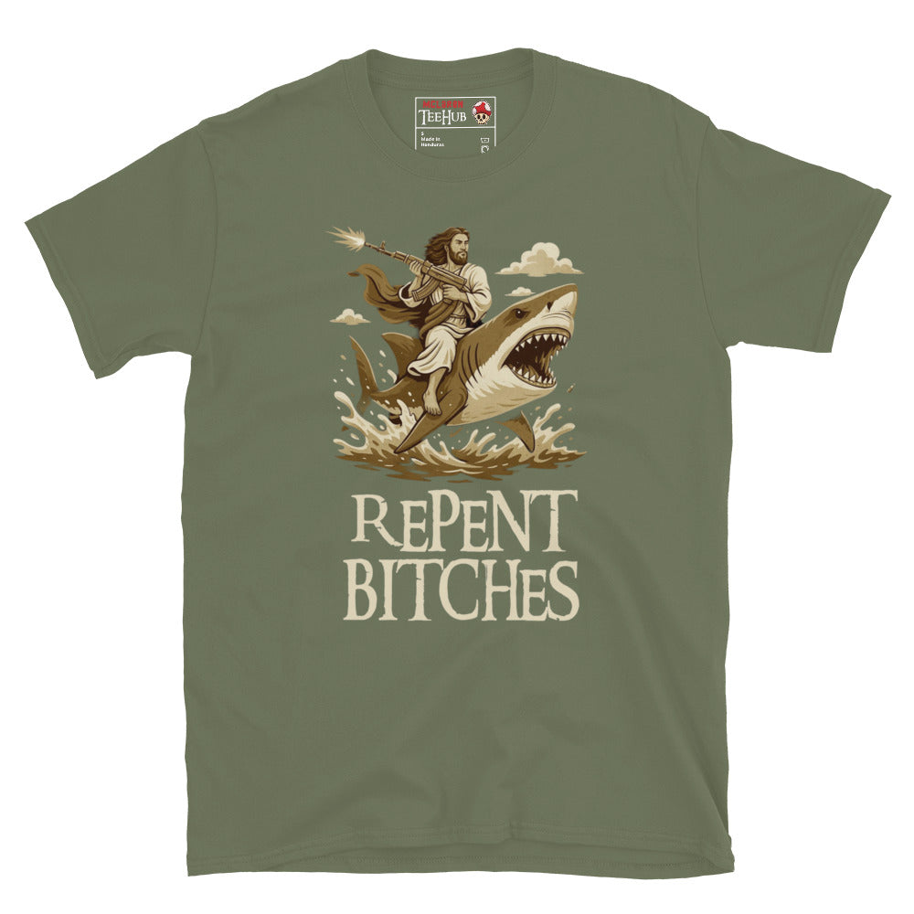 Military Green T-shirt featuring an illustration of Jesus riding a shark and holding a machine gun, with the phrase “Repent Bitches” written below.