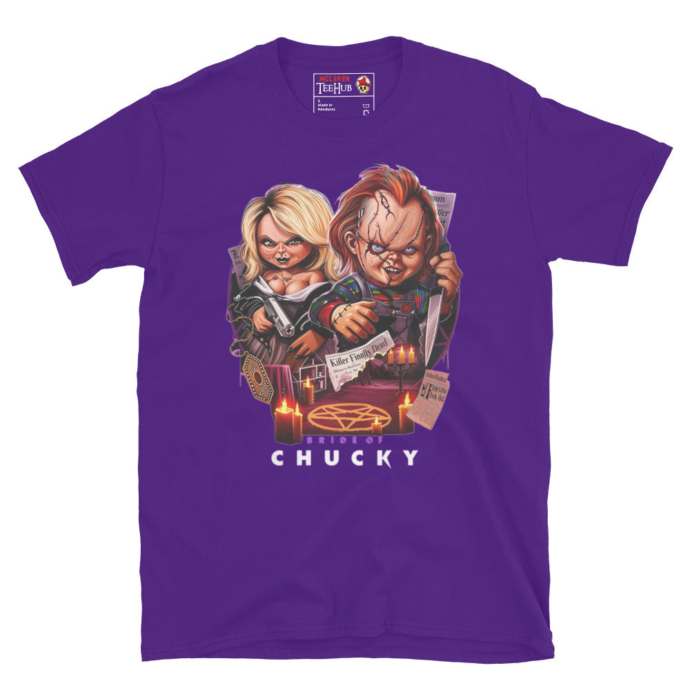 Purple T-shirt featuring a vibrant Bride of Chucky design with Chucky and Tiffany, candles, voodoo symbols, and horror aesthetic