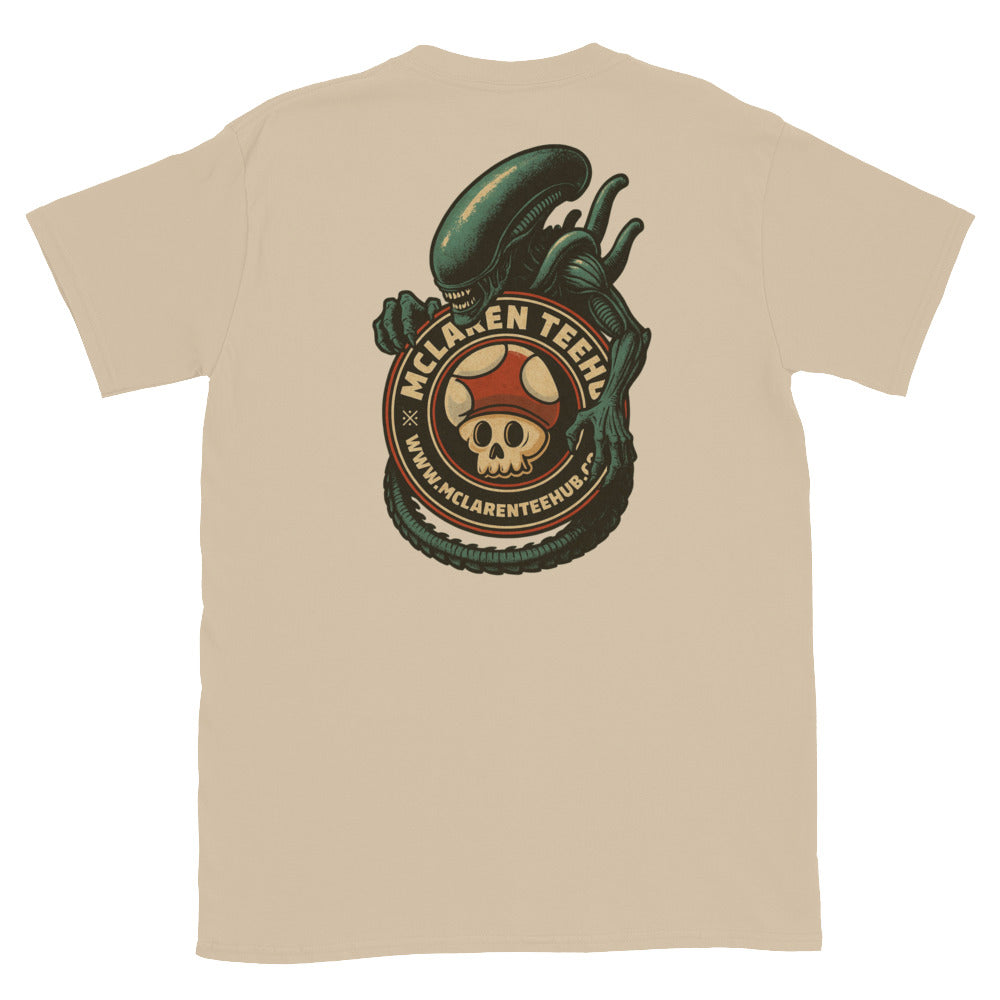 Large graphic on back of Sand T-shirt featuring an alien creature wrapped around the McLaren Tee Hub skull mushroom emblem.