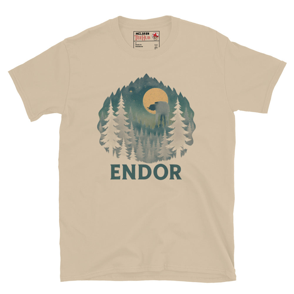 Sand T-shirt featuring a forest scene with trees, full moon, and an AT-AT silhouette, with the word “Endor” below – inspired by Star Wars.