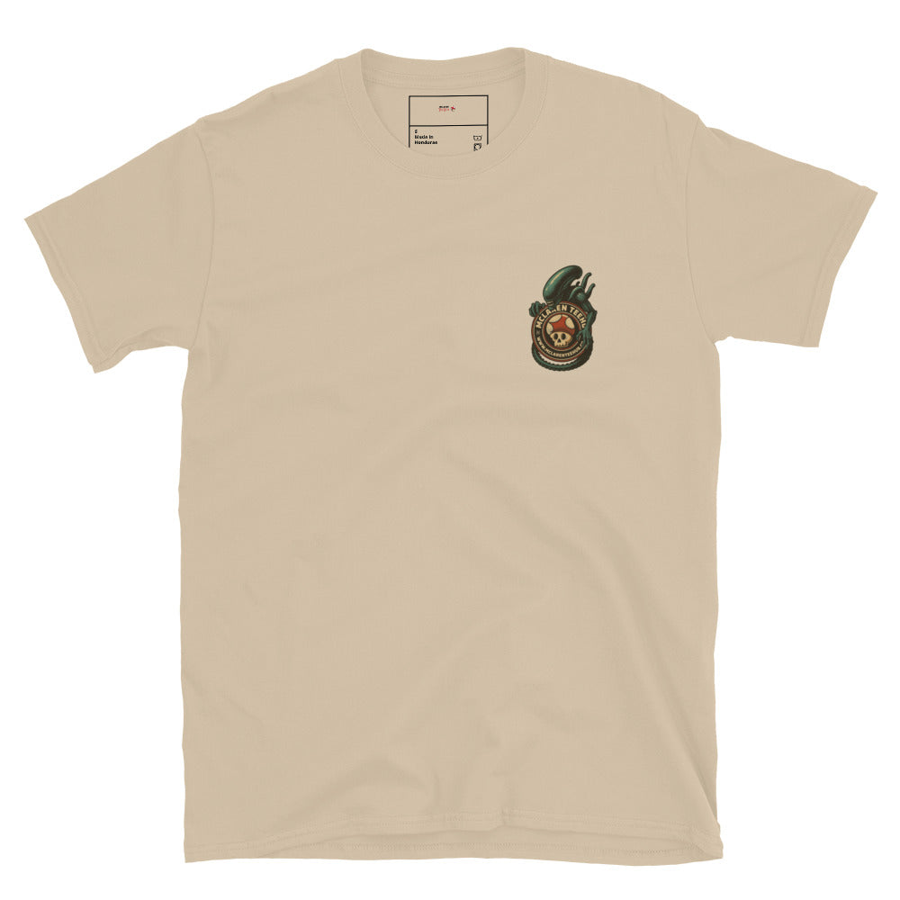 Sand T-shirt with front pocket-sized graphic of a xenomorph coiled around McLaren Tee Hub logo.