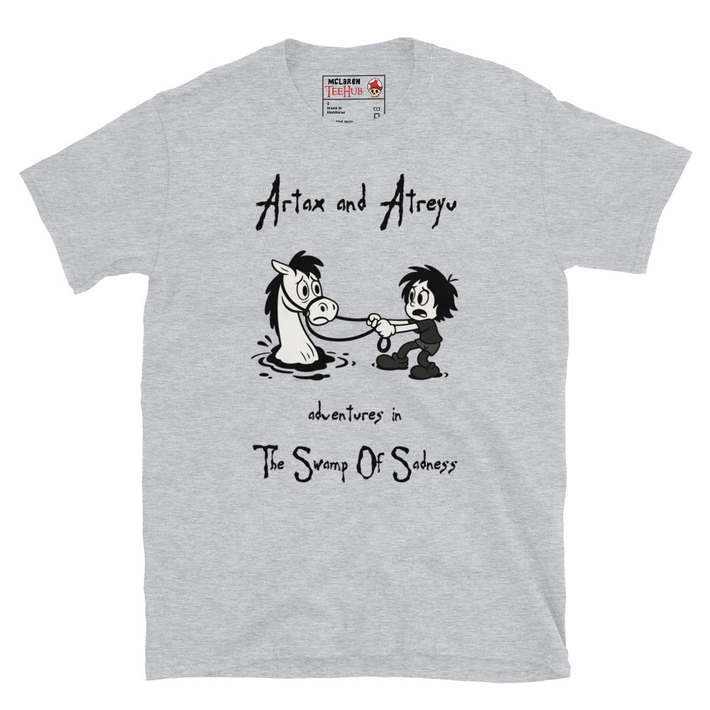 Sport Grey Cartoon-style T-shirt featuring Atreyu pulling Artax from the Swamp of Sadness, inspired by The NeverEnding Story, with the text “Adventures in the Swamp of Sadness.”