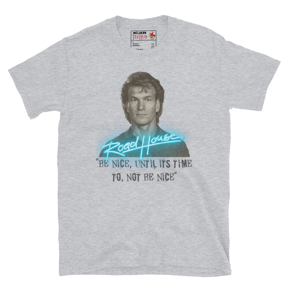 Road House Sport Grey T-shirt featuring Patrick Swayze as Dalton with the quote “Be Nice Until It’s Time to Not Be Nice” in neon style.