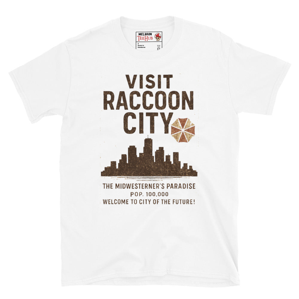 White T-shirt with vintage-style “Visit Raccoon City” graphic featuring city skyline, Umbrella Corp logo, and distressed text inspired by Resident Evil.