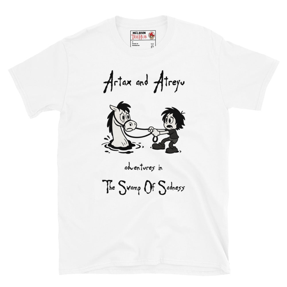 White Cartoon-style T-shirt featuring Atreyu pulling Artax from the Swamp of Sadness, inspired by The NeverEnding Story, with the text “Adventures in the Swamp of Sadness.”