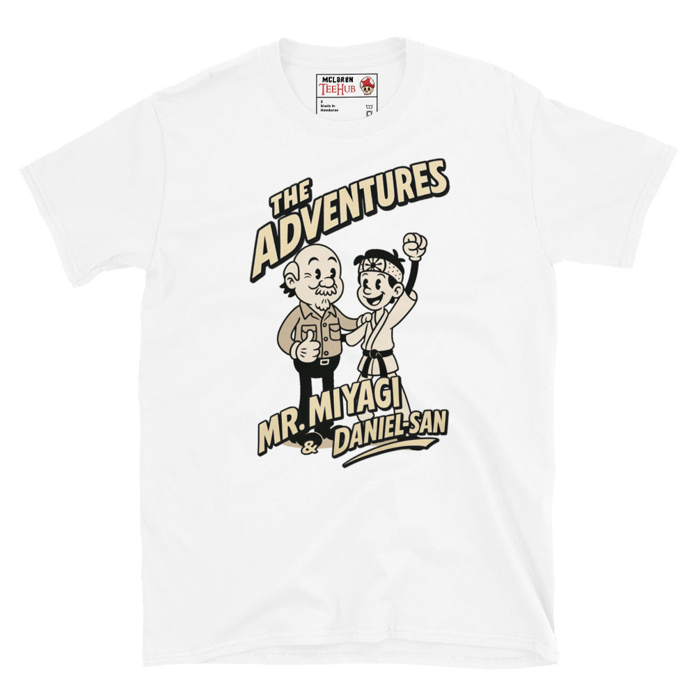 White T-shirt featuring a vintage cartoon design of Mr. Miyagi and Daniel-San from The Karate Kid, with the text 'The Adventures of Mr. Miyagi & Daniel-San'.