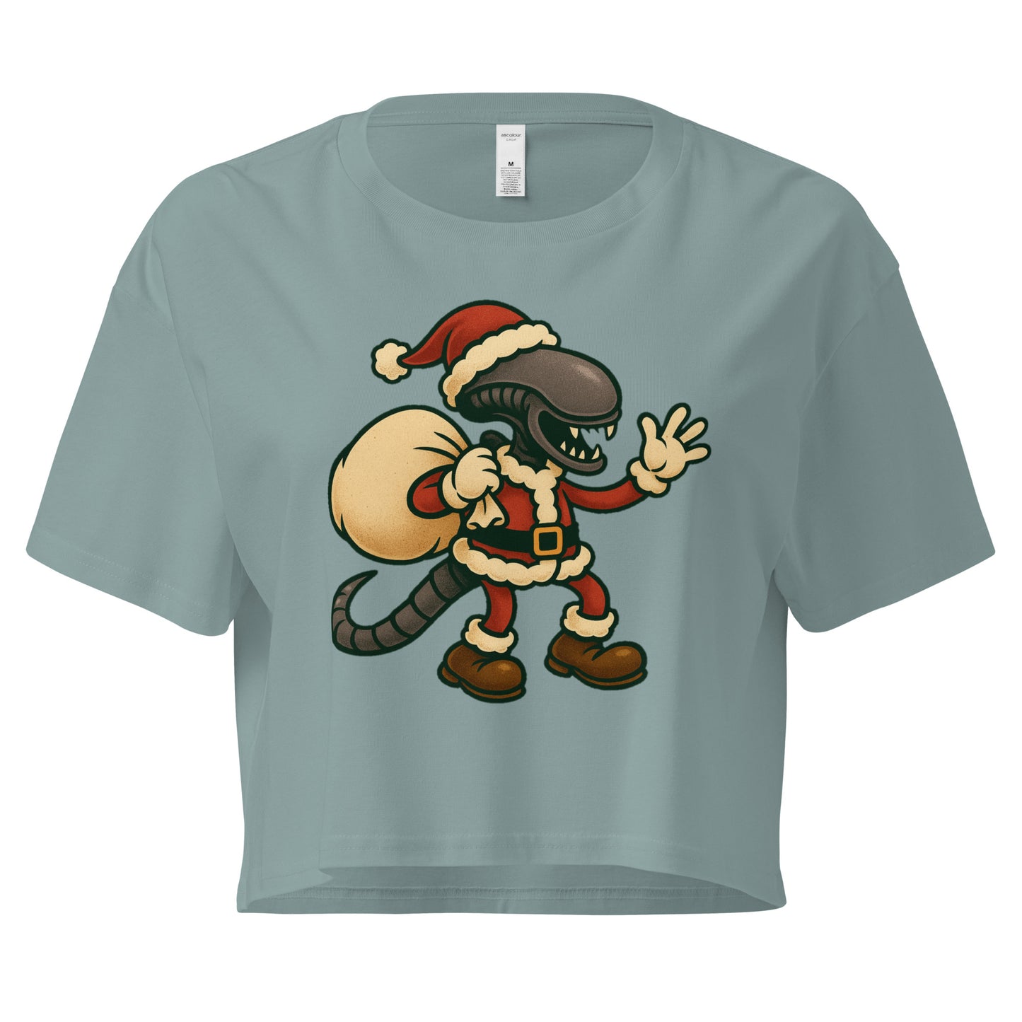 Cartoon Xenomorph in Santa suit holding gift sack – funny Alien Christmas crop top. Mineral colour