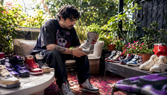Collector inspecting movie character inspired shoes