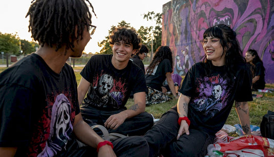Young adults wearing horror graphic tees outdoors