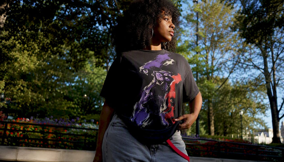 Young woman wearing statement tee outdoors