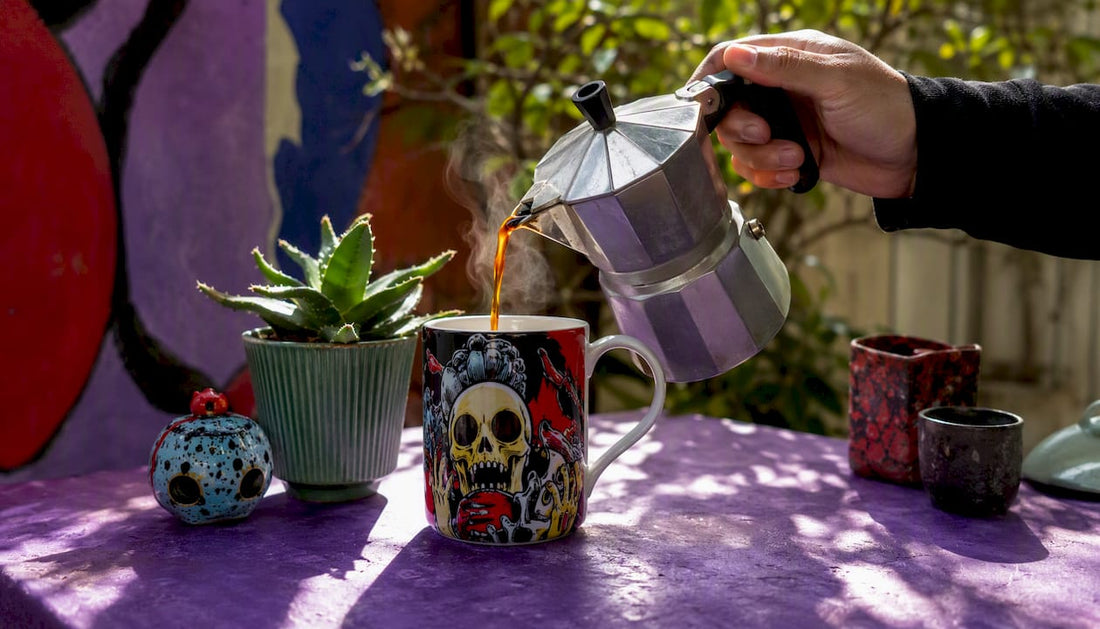Hand pouring coffee into a glossy pop-culture mug on desk