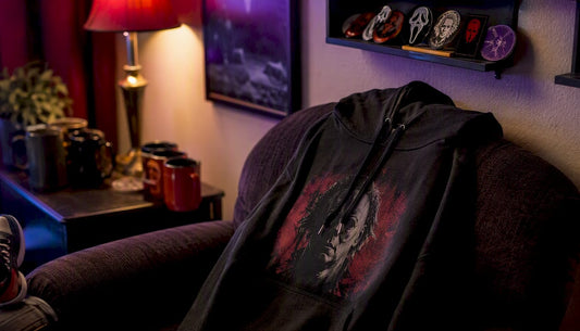 Horror hoodie and accessories in bedroom corner