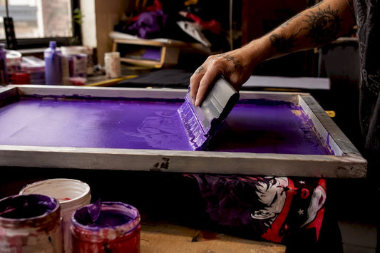 Manual screen printing on fabric close-up