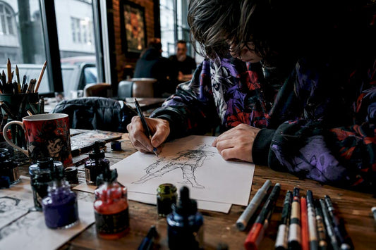 Artist sketching character design indoors