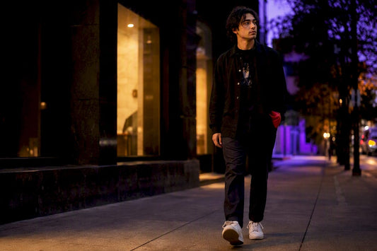Layered outfit with subtle fandom shirt detail