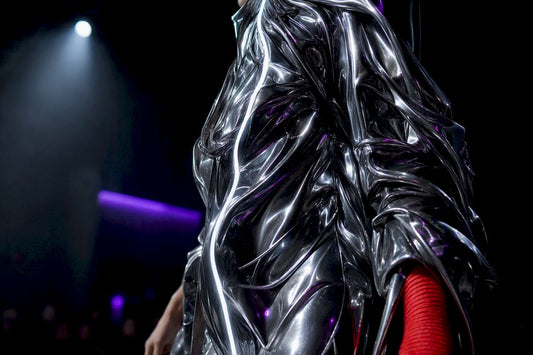 Close-up of illuminated futuristic runway garment