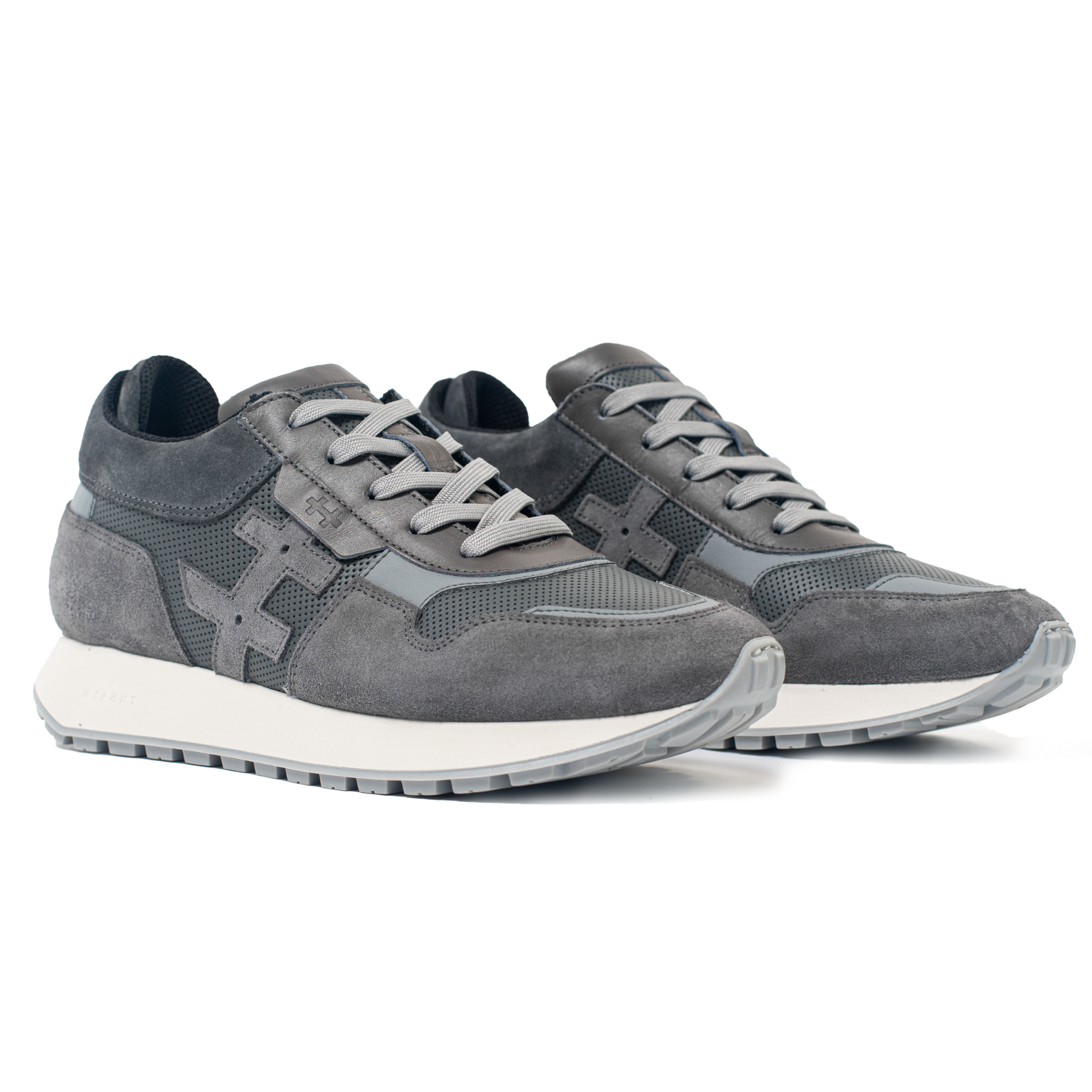 Pair of gray sneakers on a white background
