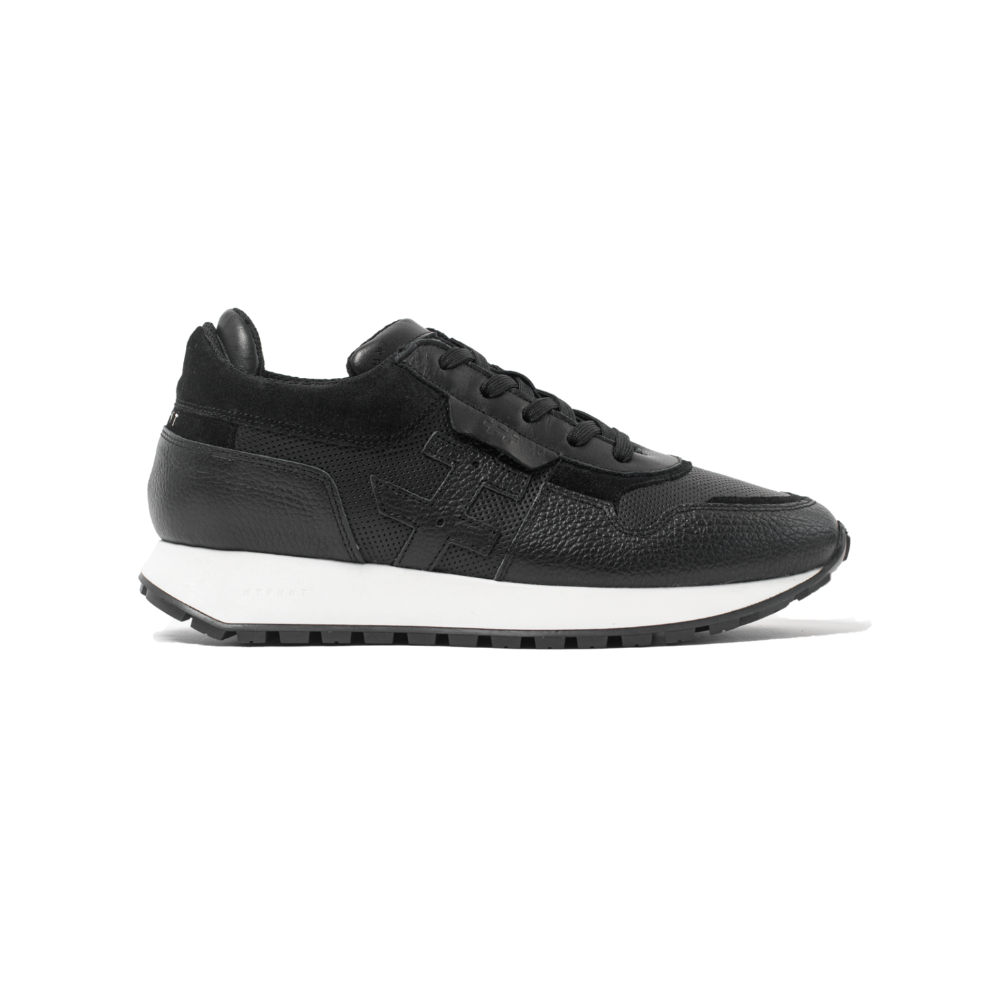Black sneaker with white sole on a white background