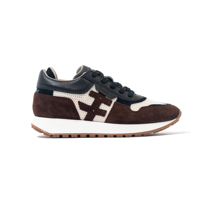 Sneaker with brown, white, and black design on a white background