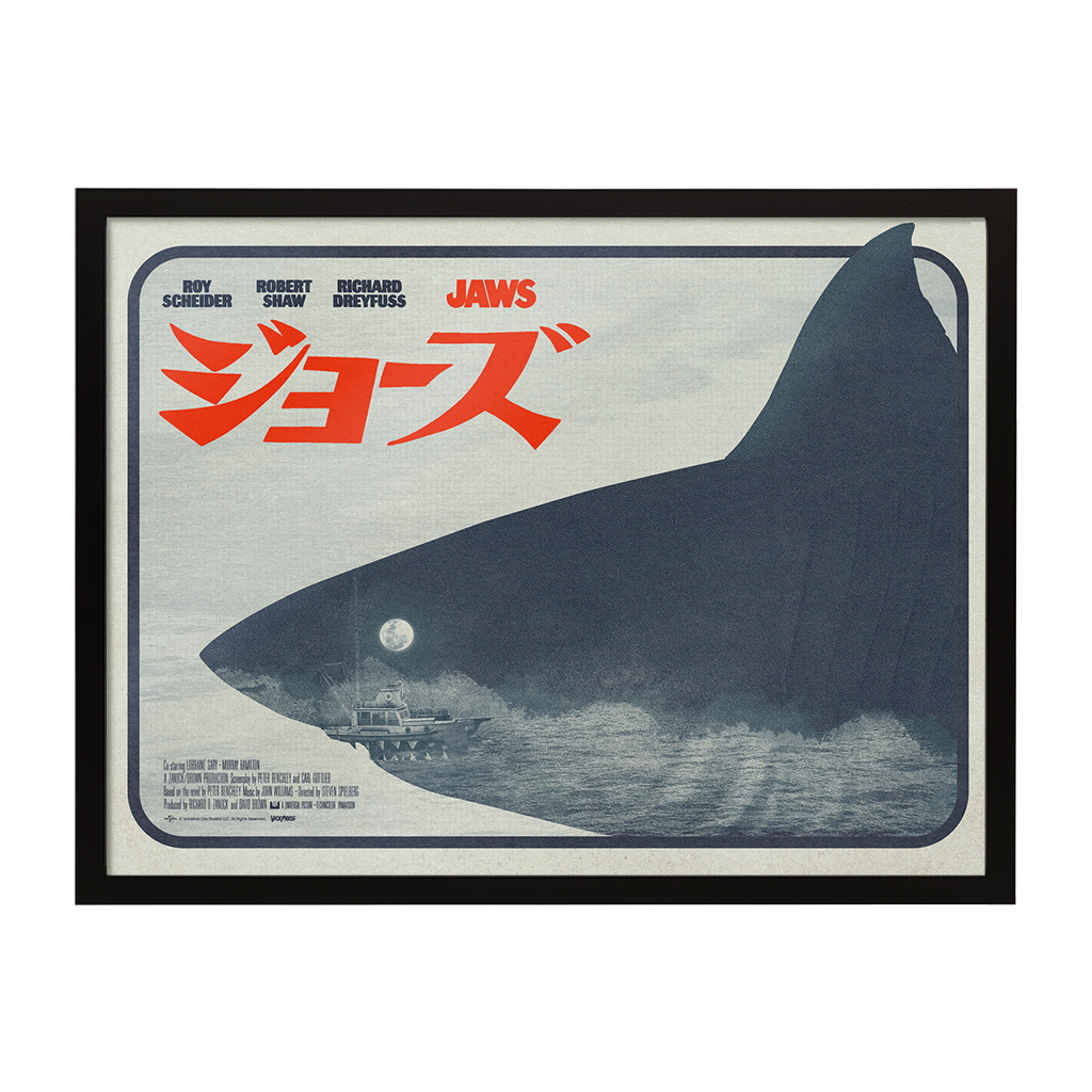 Framed poster of 'Jaws' with a shark silhouette and Japanese text.