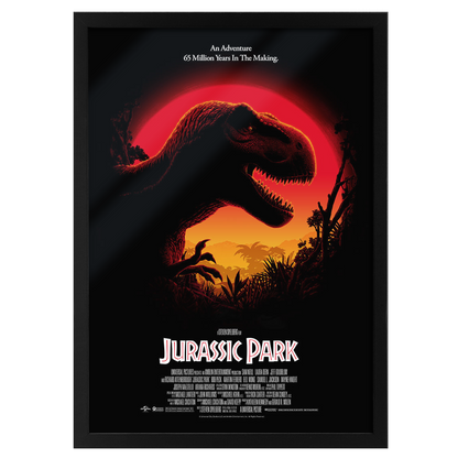 Framed movie poster of 'Jurassic Park' with a silhouette of a dinosaur against a red sky.