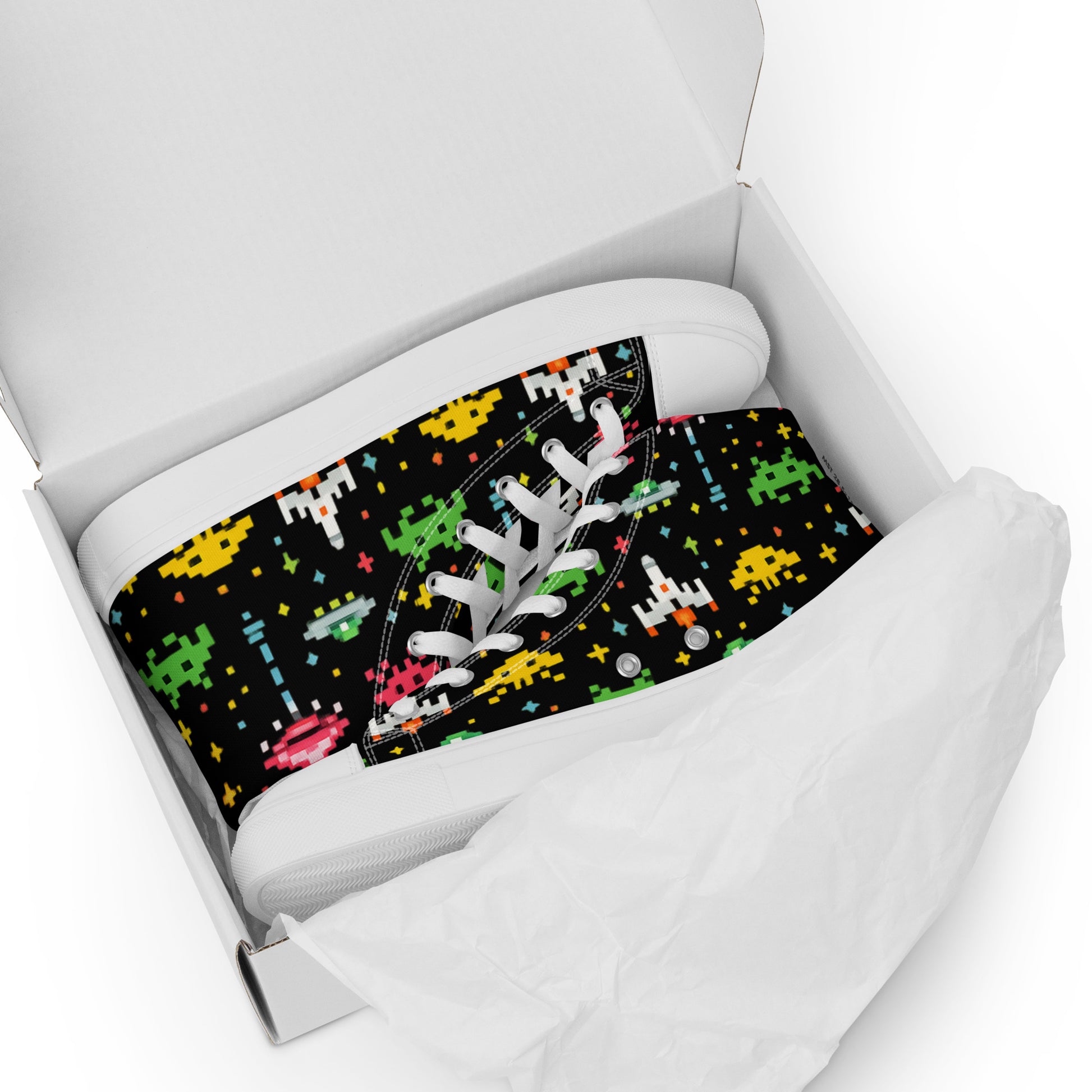 Retro space invader hi-top sneakers with colorful pixel art design, inspired by 80s arcade gaming.