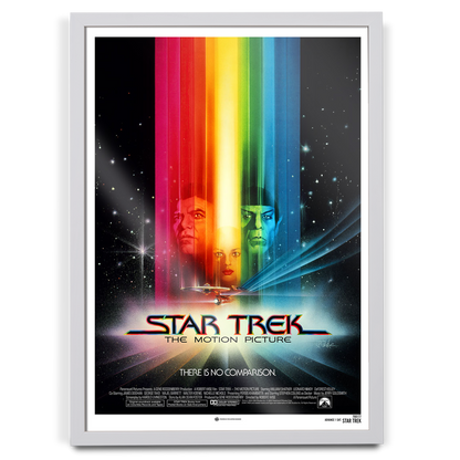 Framed Star Trek movie poster with colorful light beams and faces.