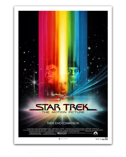 Vintage 'Star Trek' movie poster with colorful light beams and characters.