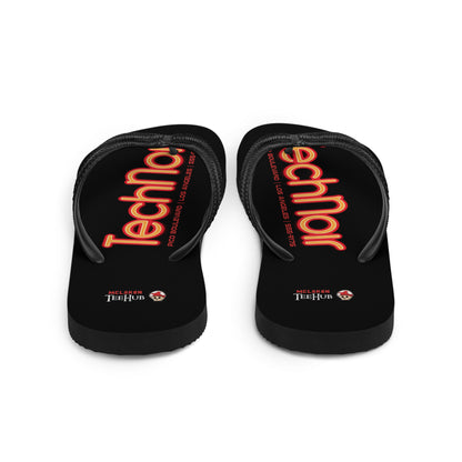 Tech Noir Terminator inspired flip flops with neon cyberpunk text design on black sole