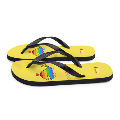 Funny rainbow whale flip flops with bright yellow base and colourful pride-inspired design