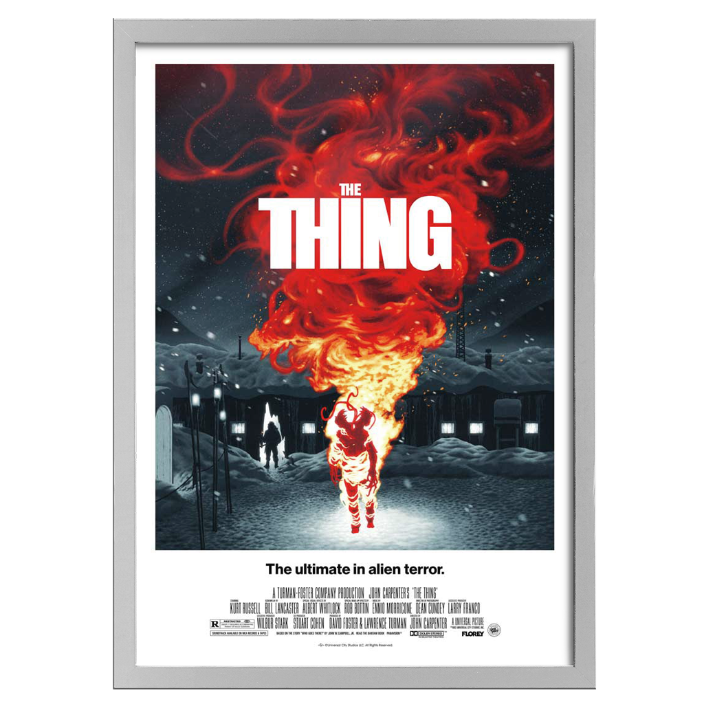 Movie poster for 'The Thing' with a fiery alien figure and snowy landscape.