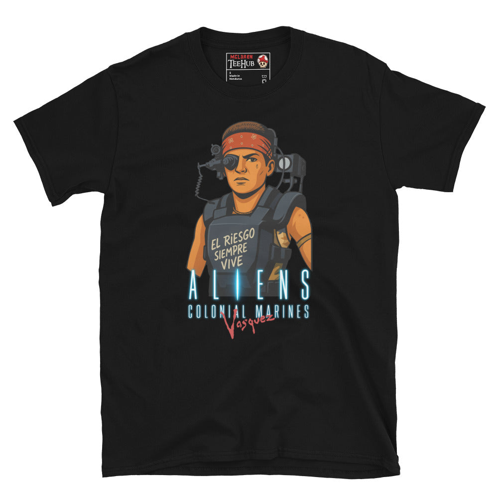 Black Aliens Colonial Marines Vasquez T-shirt featuring cartoon Vasquez in red bandana with “El Riesgo Siempre Vive” text on armor.