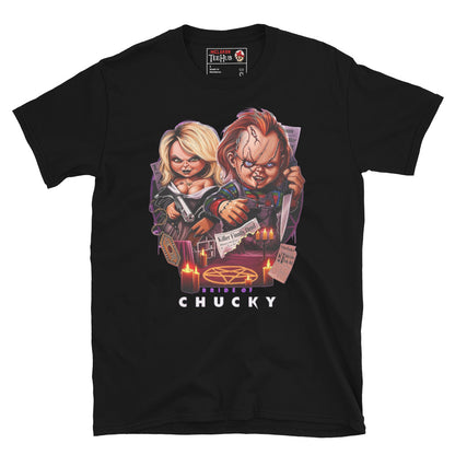 Black T-shirt featuring a vibrant Bride of Chucky design with Chucky and Tiffany, candles, voodoo symbols, and horror aesthetic