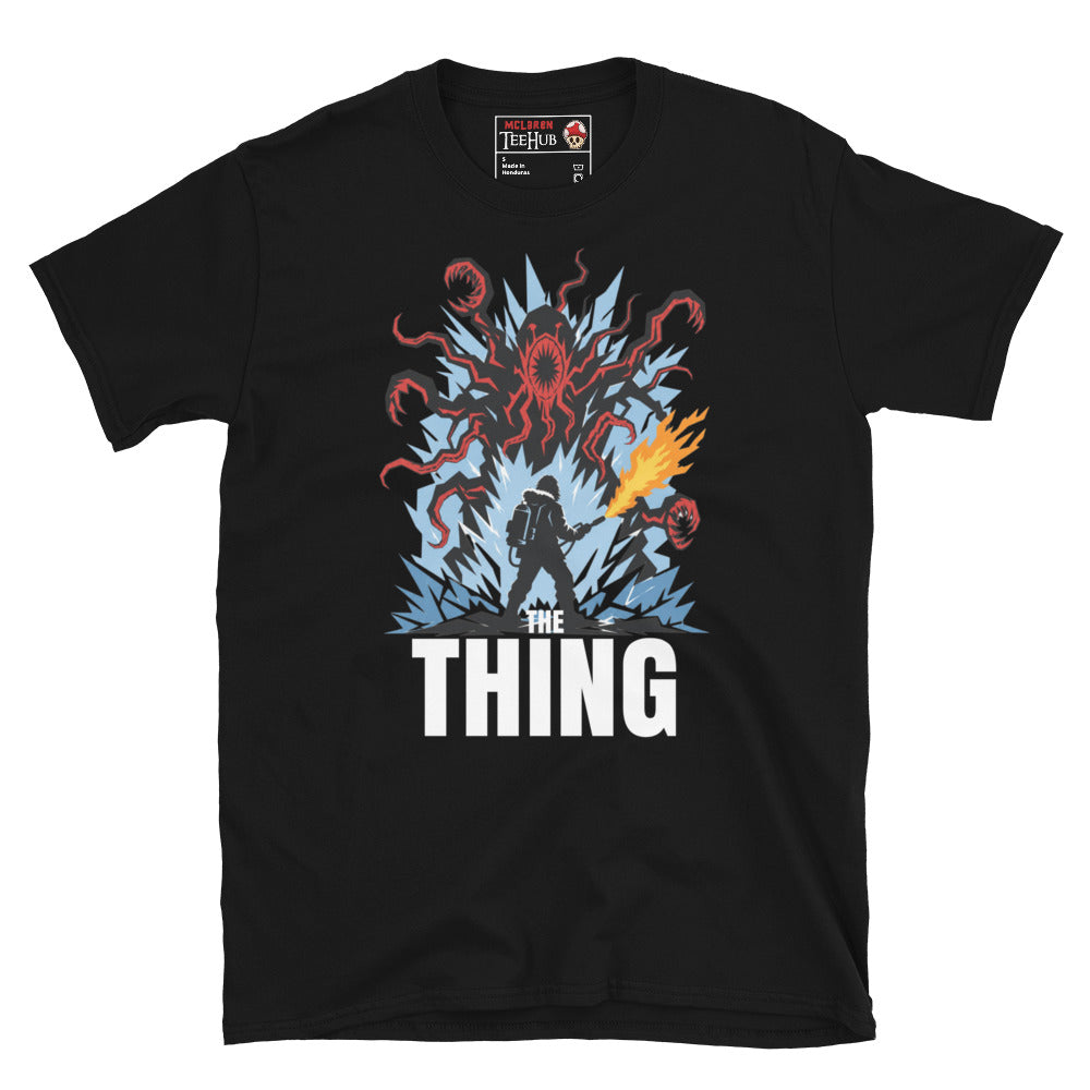 The Thing horror movie t-shirt featuring alien creature artwork and a flamethrower survivor in an Antarctic horror scene. Black