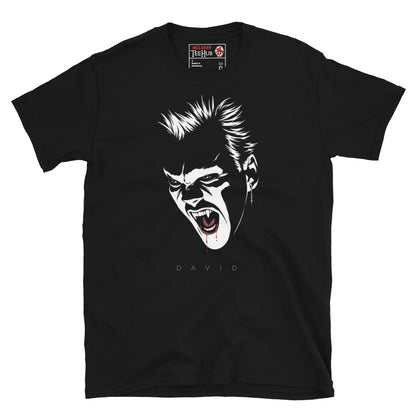 David vampire The Lost Boys inspired t-shirt featuring minimalist monochrome horror artwork with red eyes and vampire fangs. Black