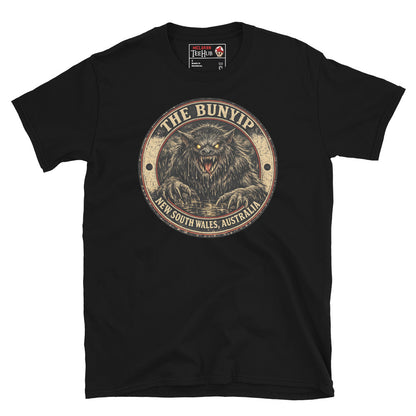 Black Bunyip New South Wales Australia t-shirt with vintage distressed badge featuring shaggy dark Bunyip rising from water with glowing amber eyes savage fangs and claws.