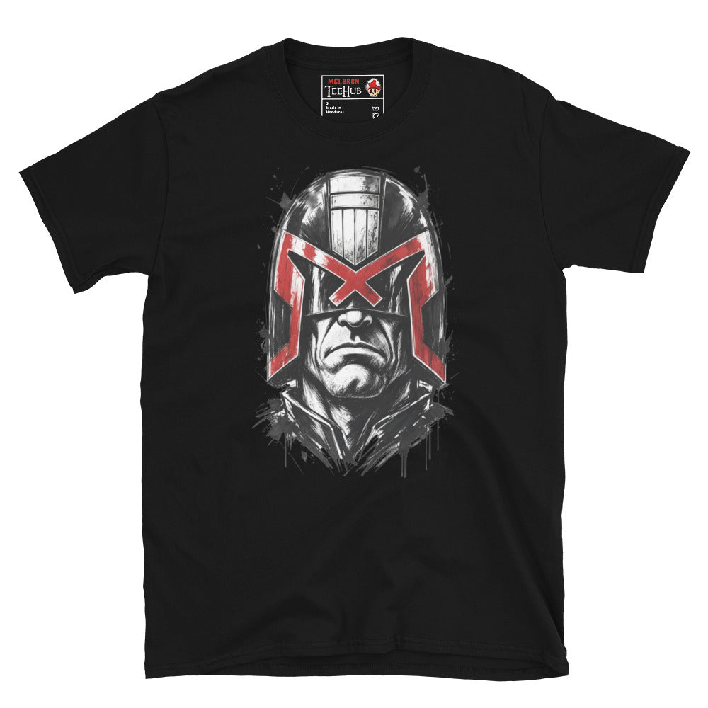 Black Judge Dredd t-shirt with dramatic ink splatter portrait featuring iconic helmet and bold red eagle visor with high contrast black ink sketch detail and splatter accents
