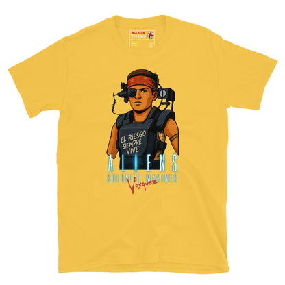 Daisy Yellow Aliens Colonial Marines Vasquez T-shirt featuring cartoon Vasquez in red bandana with “El Riesgo Siempre Vive” text on armor.