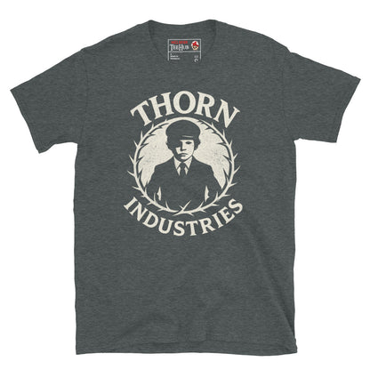 Dark Heather T-shirt featuring the fictional "Thorn Industries" logo with a silhouette of Damien Thorn from The Omen, surrounded by a thorny wreath.