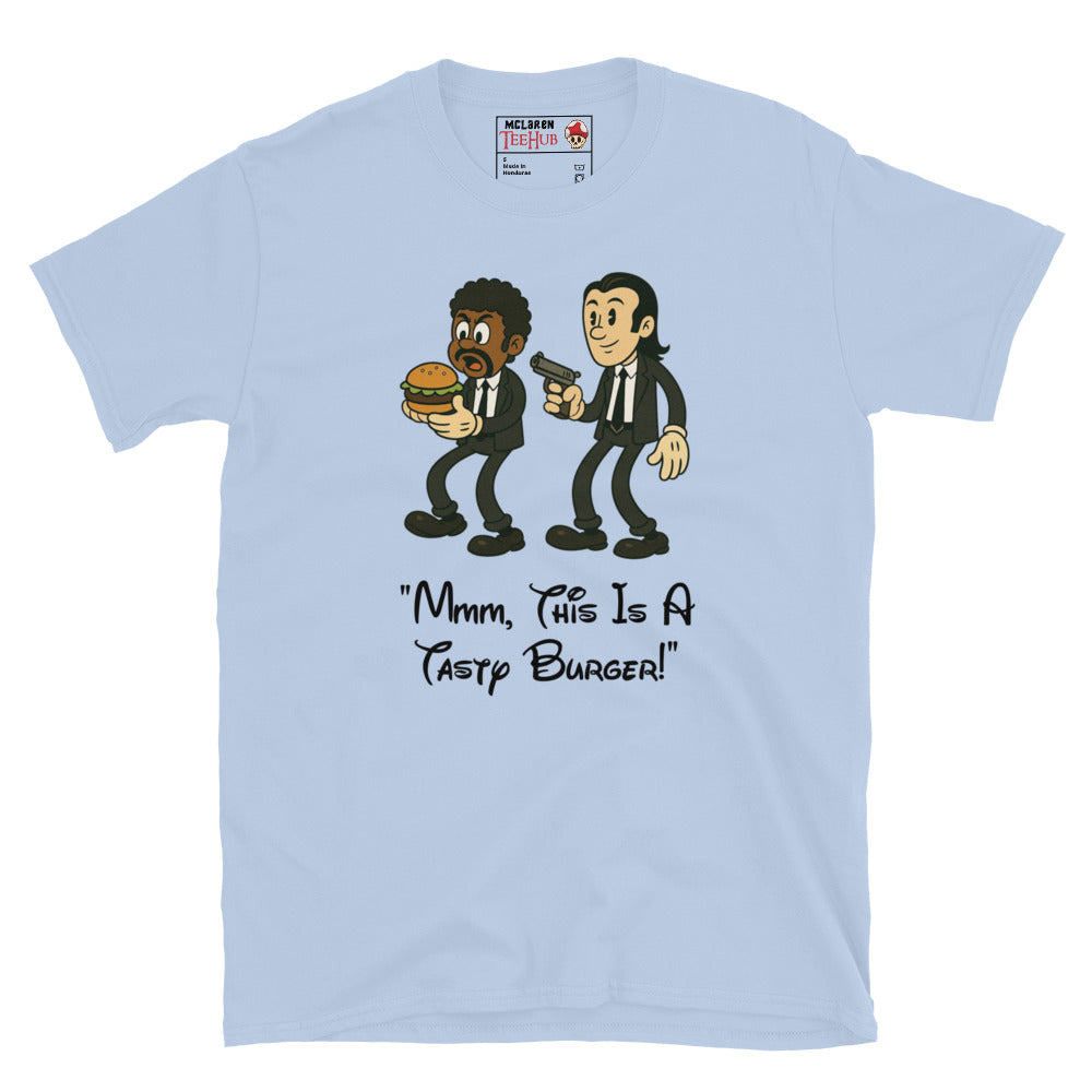 Light blue T-shirt with cartoon characters resembling Jules and Vincent from Pulp Fiction, holding a burger and a gun, with the quote “Mmm, This Is a Tasty Burger!”