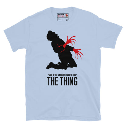 The Thing Bennings transformation t-shirt featuring minimalist horror artwork and the quote Man Is The Warmest Place To Hide. Light Blue