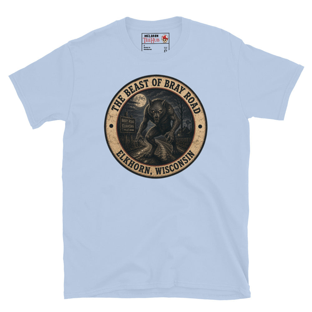 Light Blue Beast of Bray Road Elkhorn Wisconsin t-shirt with vintage distressed badge featuring snarling werewolf figure on moonlit road with Bray Road signpost.