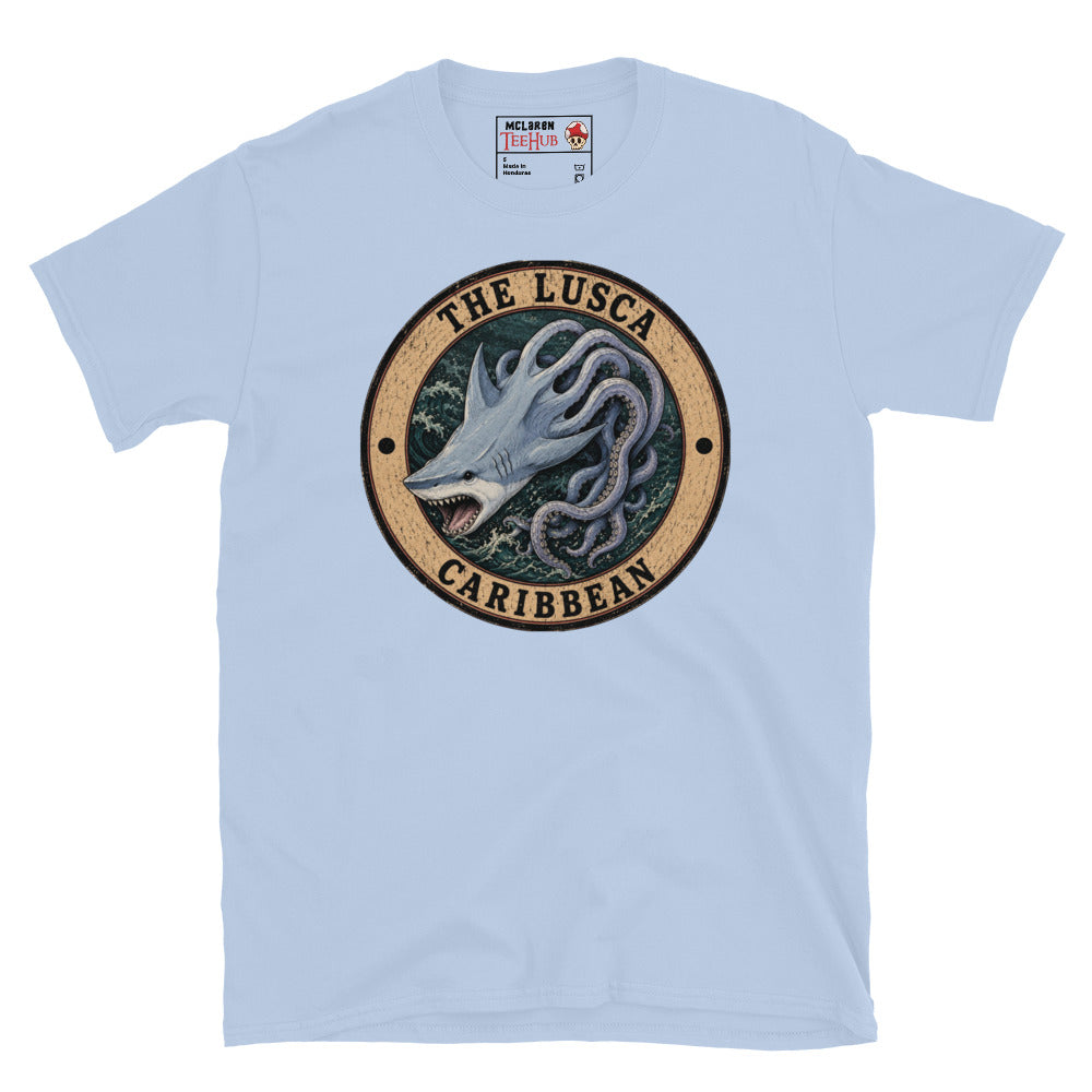 Light Blue Lusca Caribbean sea monster t-shirt with vintage distressed badge featuring half shark half octopus cryptid with open jaws and writhing tentacles in stormy Caribbean waters.