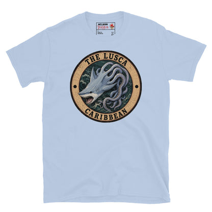 Light Blue Lusca Caribbean sea monster t-shirt with vintage distressed badge featuring half shark half octopus cryptid with open jaws and writhing tentacles in stormy Caribbean waters.