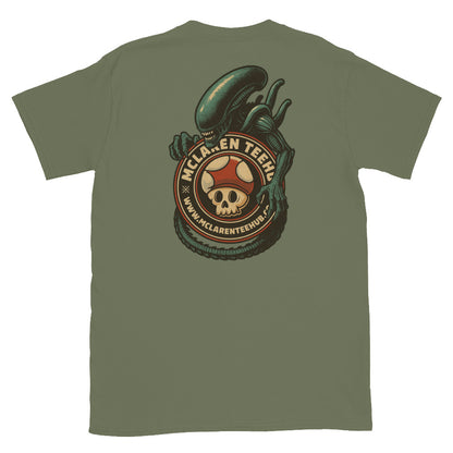 Large graphic on back of military green T-shirt featuring an alien creature wrapped around the McLaren Tee Hub skull mushroom emblem.
